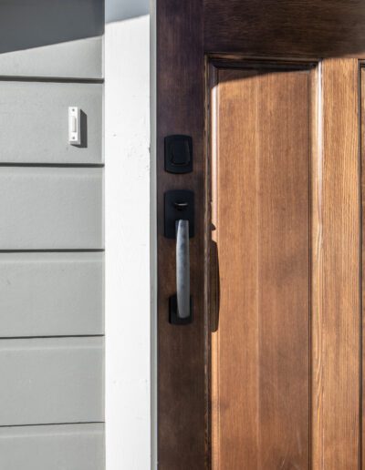 A close up of a wooden door handle.