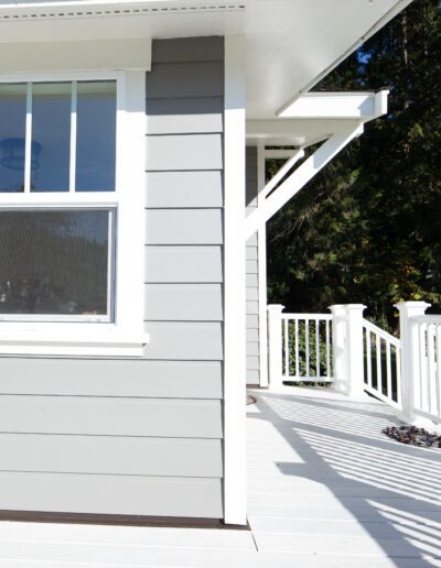 A white house with a window.