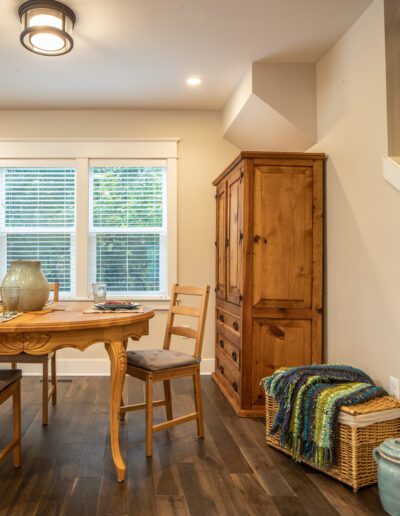 A wooden floor in the dining room.