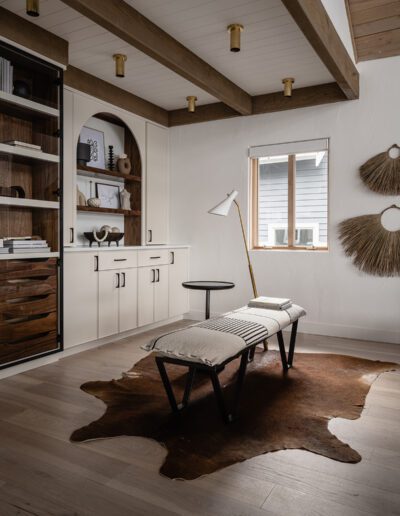 A modern home office with a cowhide rug.