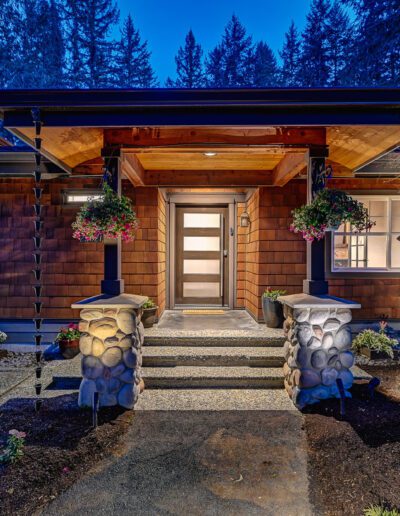 The entrance to a home at night.